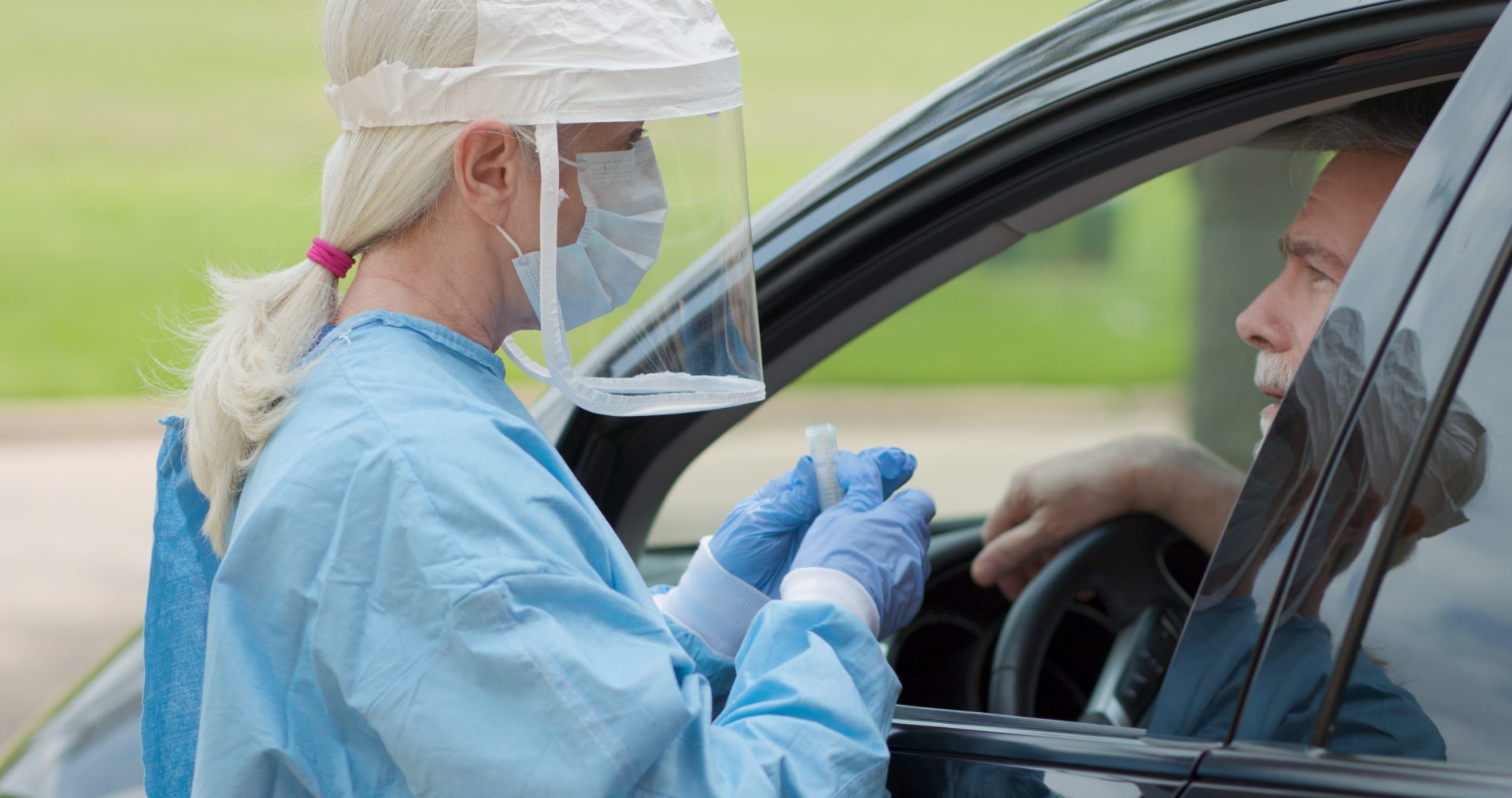 woman at drive up coronavirus test station