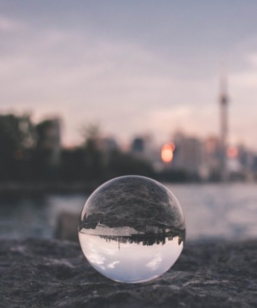 Glass ball with inverted city scene